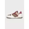 Textile and leather sneakers with raw seams