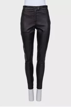 Leather trousers with zippers at the bottom