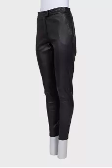 Leather trousers with zippers at the bottom