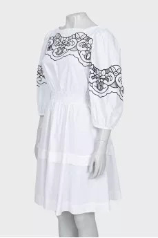 Fitted dress with embroidered sleeves
