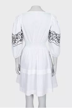 Fitted dress with embroidered sleeves