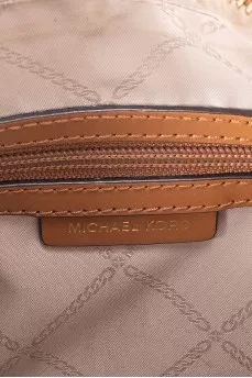 Canvas and leather bag with signature monogram