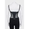 Corset with zipper and transparent inserts