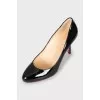 Black patent leather pumps