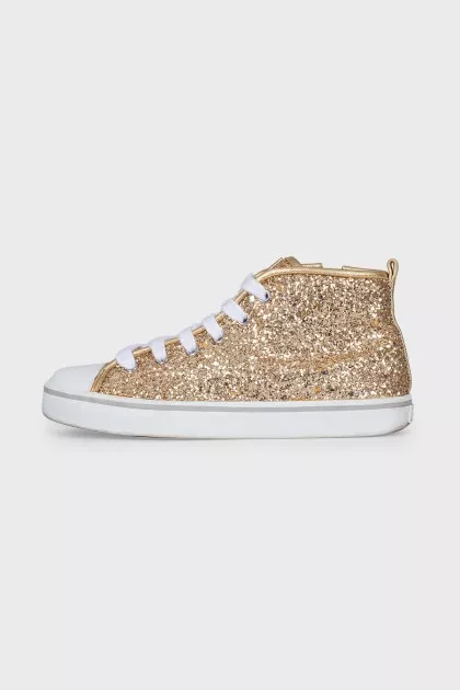 Shiny gold colored sneakers