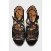 Leather sandals with printed soles