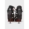 Leather sandals with printed soles