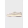 Grey suede slip-ons