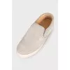 Grey suede slip-ons
