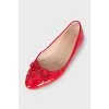 Red patent leather ballet flats