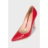 Red patent leather pumps