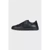 Men's leather sneakers with metal decor