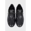Men's leather sneakers with metal decor