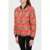 Red bomber with zipper pockets