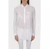 Blouse shirt with a fastener