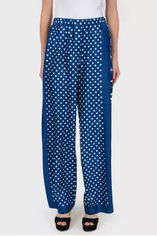 Wide trousers in white polka dots