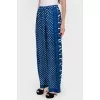Wide trousers in white polka dots