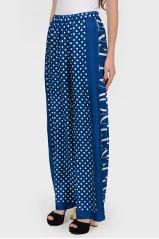 Wide trousers in white polka dots