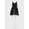 Black dress with flared skirt