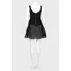 Black dress with flared skirt