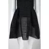 Black dress with flared skirt