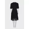 Cashmere dress decorated with fringe