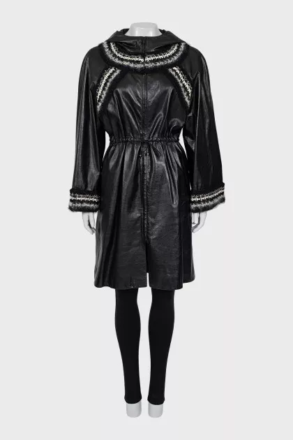 Leather coat with knitted elements