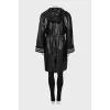 Leather coat with knitted elements