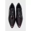 Patent leather shoes in burgundy color