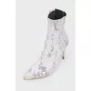 Ankle boots with botanical print and stiletto heels