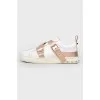 White sneakers with belt buckle