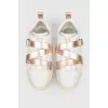 White sneakers with belt buckle