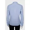 Blue shirt with decor