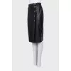 Skirt with accent buttons on the side