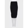 Pencil skirt with a pleat at the back