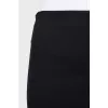 Pencil skirt with a pleat at the back