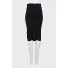 Pencil skirt with a pleat at the back