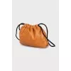 Leather bucket bag with removable strap