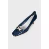 Blue shoes with stacked heels