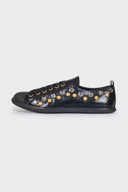 Leather sneakers with massive decor