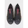 Leather sneakers with massive decor