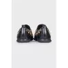 Leather sneakers with massive decor