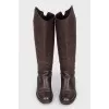 Boots with embossing in the form of a logo