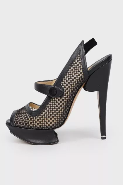 Stiletto sandals with designer soles