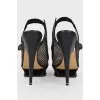 Stiletto sandals with designer soles
