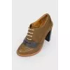Brown boots with dark blue patch