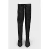 Textile black boots with a slight shine