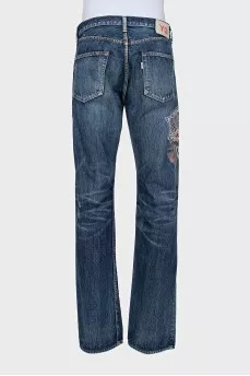Men's jeans with red stripes on the side