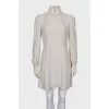 Dress with perforated sleeves