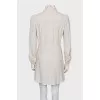 Dress with perforated sleeves